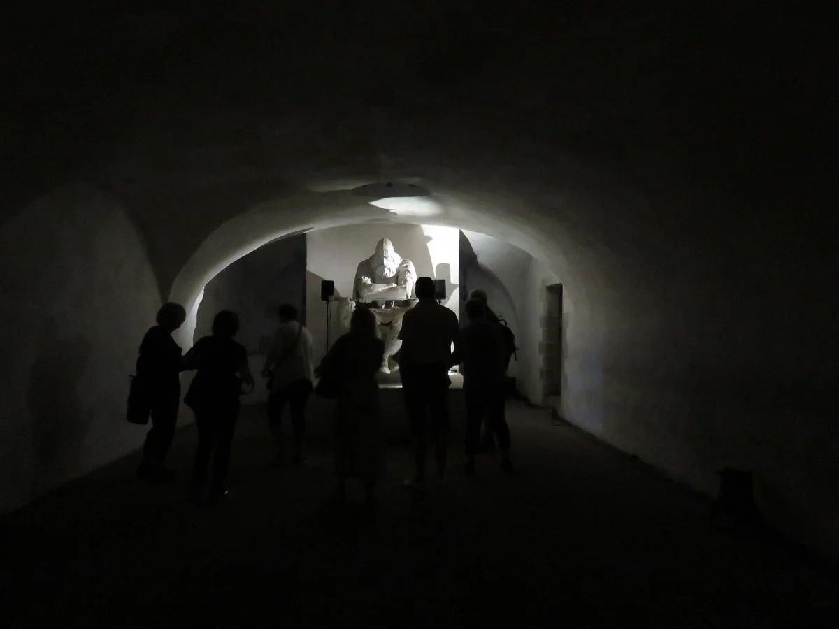 Visitors around the statue of Holger Danske in the casemates of Hamlet Castle