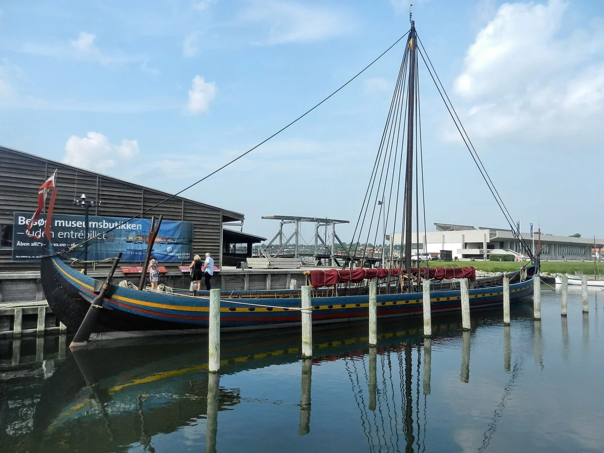 Reconstructed Viking ships in the harbour of the Viking Ship Museum on a Kronborg and Viking Ship Museum tour